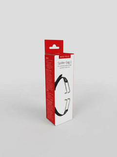 Artistic display of the Spider Stretch Gag, a luxurious BDSM accessory perfect for exploring desire and submission.