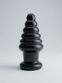 Prowler RED Twisted Tease Large Butt Plug Black, a luxurious and advanced anal plug designed for experienced users, featuring a unique 6-ring tapered shape for progressive stimulation and substantial fullness.