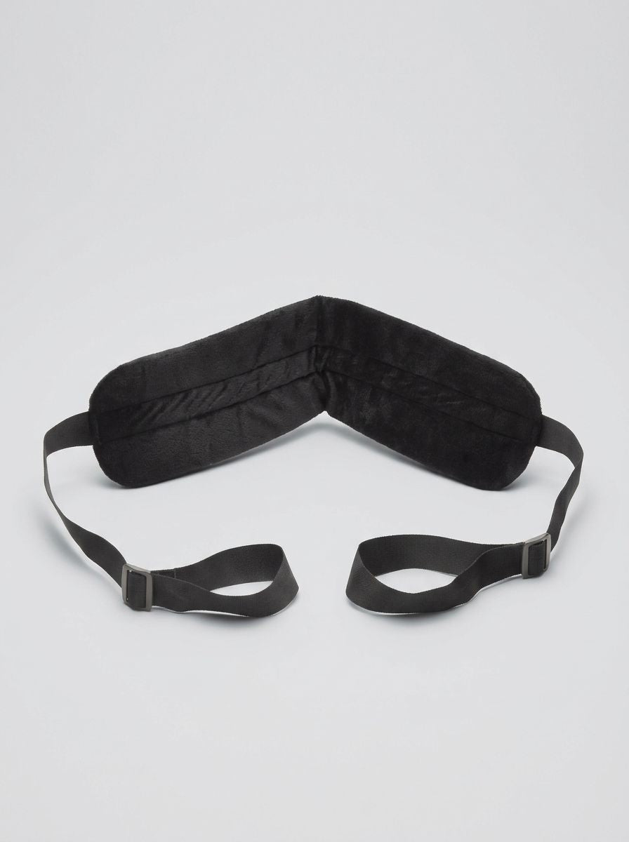 Bedroom Bliss Lover's Position Strap for enhanced bedroom intimacy, showing padded angle control strap on a bed.