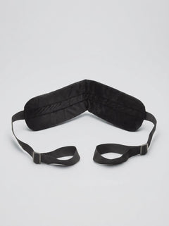 Bedroom Bliss Lover's Position Strap for enhanced bedroom intimacy, showing padded angle control strap on a bed.