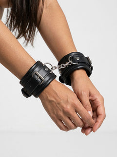 Me You Us Wrist Cuffs – Black/Silver, luxury PU leather wrist cuffs with silver-tone detailing