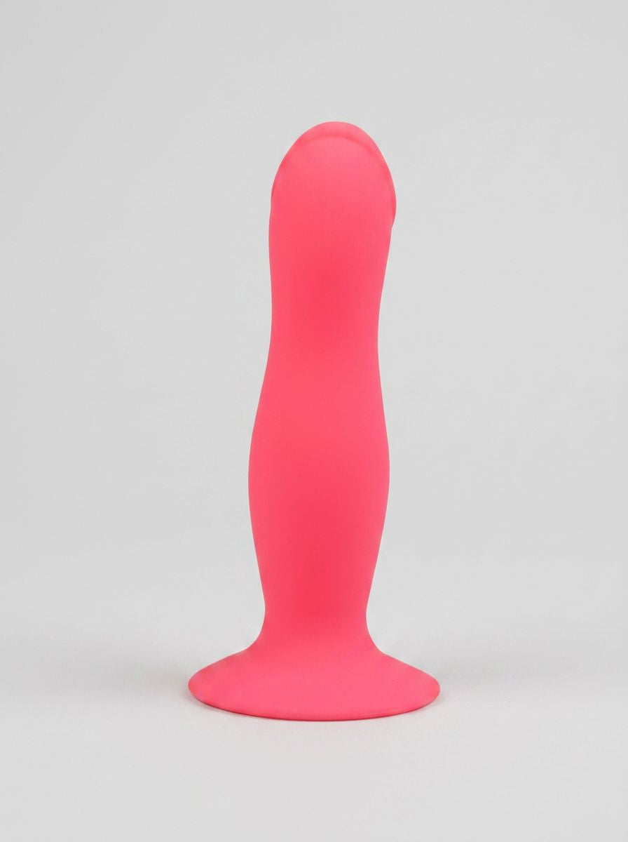 6-inch silicone G-spot dildo with suction cup from Loving Joy, designed for beginners, featuring smooth texture and flexible base.