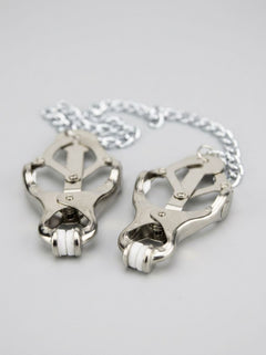 Sophisticated Bound to Please Clover Nipple Clamps featuring a butterfly design, highlighting their stylish elegance and comfort for the discerning BDSM aficionado.