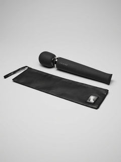 Le Wand Rechargeable Wand Massager Vibrator Black displayed with its protective travel pouch for discreet storage and luxury portability.