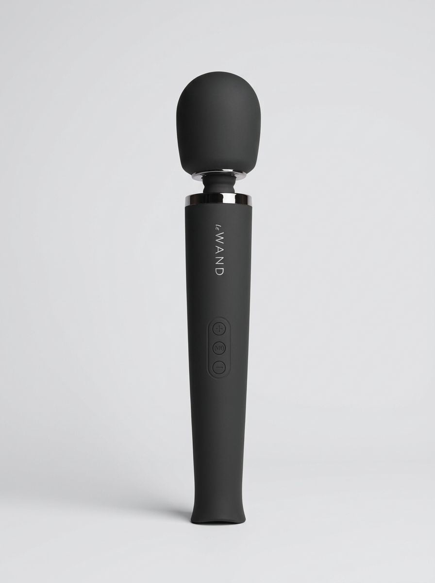 Le Wand Rechargeable Wand Massager Vibrator Black standing upright against a light background, highlighting its sleek ergonomic design and control buttons.