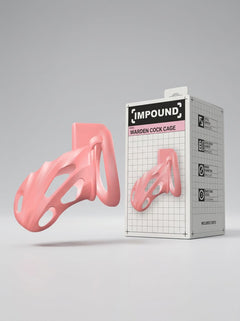 Impound Warden Pink Plastic Chastity Cock Cage pink chastity cock cage displayed beside its luxury retail packaging.