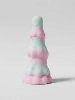 F**kLore Ghost Silicone Tiered Textured Fantasy Dildo in pastel pink and mint green, side view of the tiered fantasy dildo