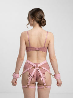 Elegant view of Strict Bondage Harness with Bows Pink ML, ideal bondage harness for stylish and comfortable restraint.