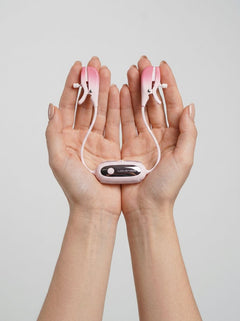 Elegant LOVENSE Gemini vibrating nipple clamps, showcasing their app-controlled technology for customizable stimulation and exquisite pleasure.