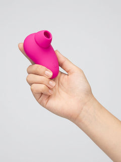 Me You Us Signature The Tapper Clitoral Pulsating Suction Vibrator in black, product view
