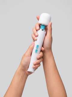 Le Wand Classique Petite Vibrating Wand Massager White showcasing its elegant design and powerful features, perfect for versatile muscle relief.