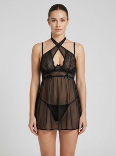 Gorgeous model wearing the Seven Til Midnight 2 Piece Lace & Mesh Babydoll And Panty Set, highlighting seductive style and romantic allure.