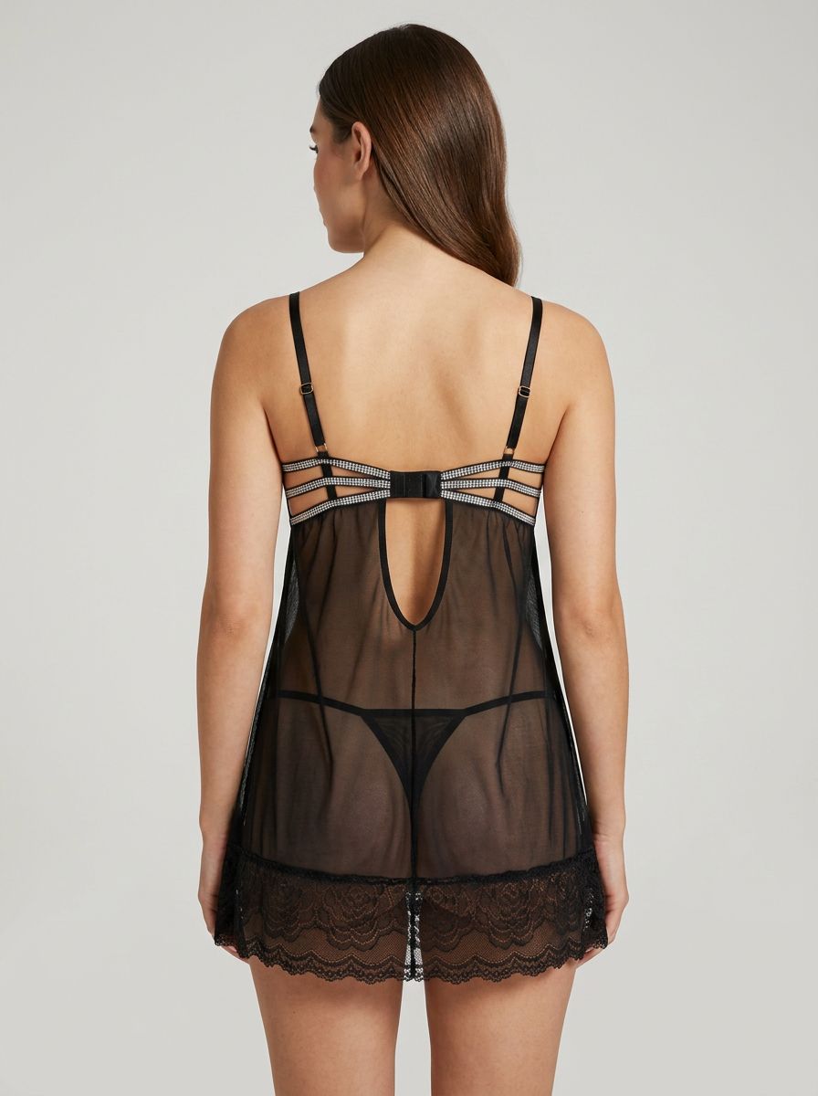 Seven Til Midnight Glitterati sparkly babydoll and thong set featuring shimmering fabric and delicate lace details.