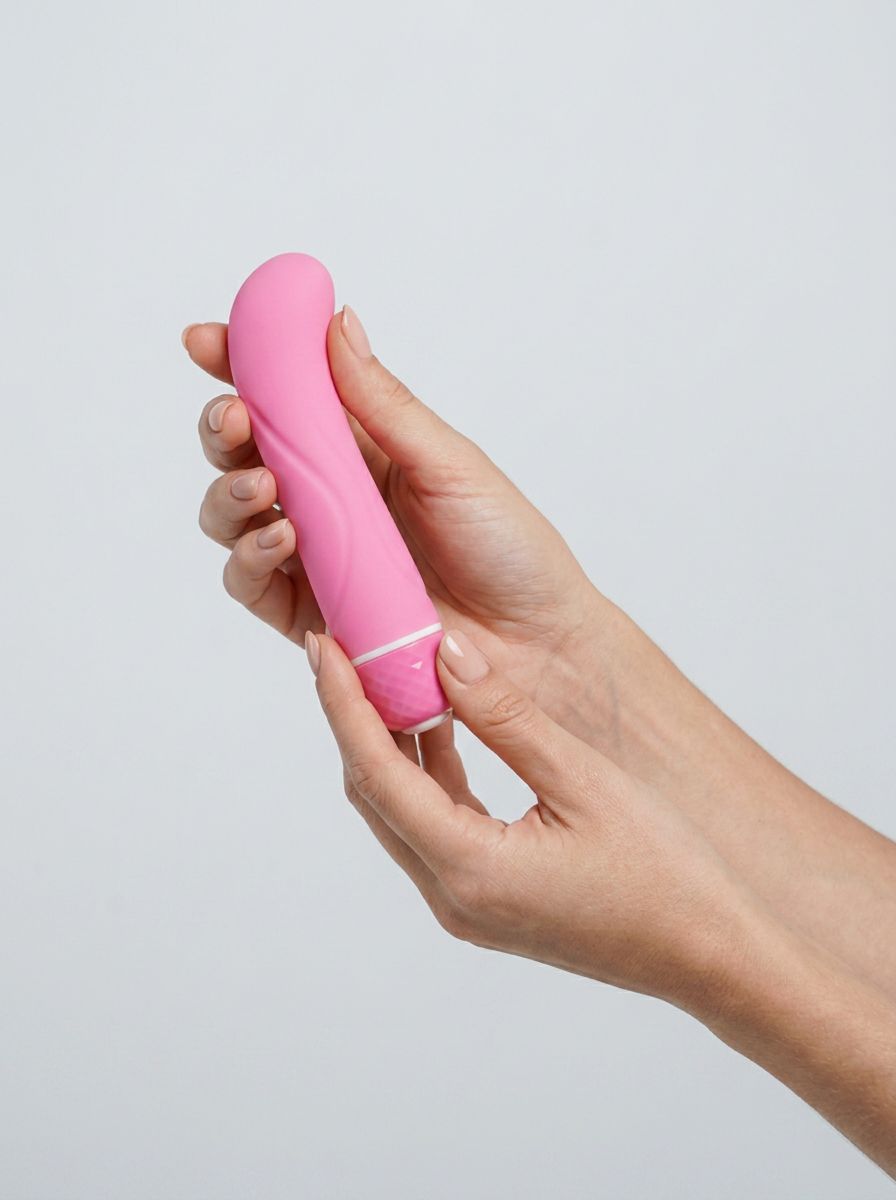 Vibe Therapy silicone curved mini G-spot vibrator with textured surface and ergonomic design for targeted pleasure.