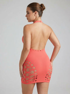 Back view of the model in the Fantasy Lingerie Neon Pink Aphrodisiac UV Reactive Open Cup Halter Dress, highlighting the elegant silhouette and open back design.
