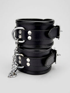 High-quality BOUND Leather Wrist Restraints with black finish and silver accents, ideal for those seeking luxury in their intimate moments.
