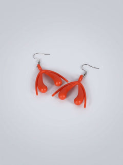 Vibrant and playful Minimalist 3D Printed Clitoris Drop Earrings, a statement jewellery piece available in Dark Green, Light Green, Red, and Pink.