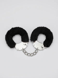 Me You Us Fluffy Quick Release Handcuffs - striking black fluffy cuffs neatly arranged, emphasizing their design and premium quality for sophisticated pleasure.