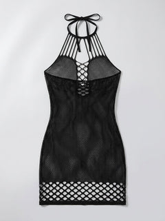 The Pink Lipstick All Talk Fishnet Cut Out Dress in Black laid flat, revealing the exquisite fishnet texture and daring cut out design, perfect for elegant lingerie styling.