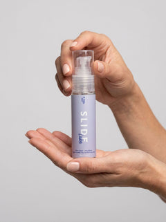 Close-up view of Loving Joy Slide Water-Based Lubricant highlighting its aloe-infused, pH neutral composition for enhanced pleasure.