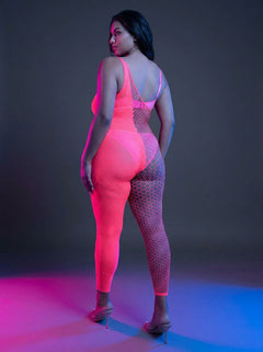 Elegant display of the Fantasy Lingerie Glow Hyperdrive UV Reactive Rhinestone Bodystocking, showcasing its unique asymmetrical design and UV bodystocking features.