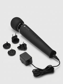Le Wand Rechargeable Wand Massager Vibrator Black shown with charging cable, power adaptor and interchangeable travel plugs.