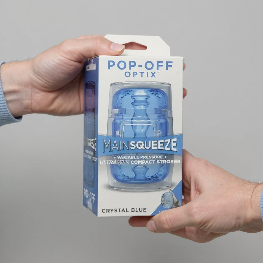 Main Squeeze Pop Off Optix Blue Transparent Masturbator, a luxurious and visually-stimulating men's masturbator featuring a transparent design and textured ULTRASKYN insert.