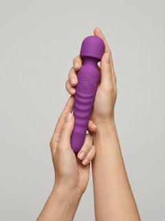 Scandals waterproof double-ended vibrator with heating, 7 speeds, flexible silicone design, suitable as a wand or dildo attachment.
