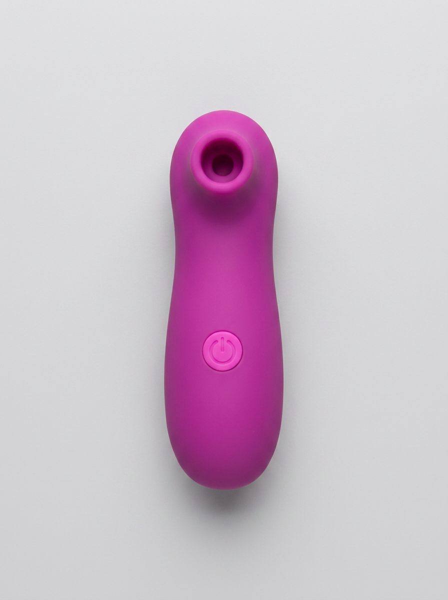 Loving Joy 10-function clitoral vibrator stimulator with textured surface and sleek design, suitable for intimate pleasure.