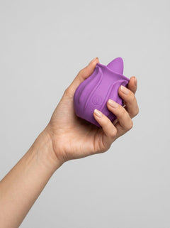Purple Loving Joy Rose Licking Clitoral Vibrator with detailed rose design and textured surface for enhanced pleasure.