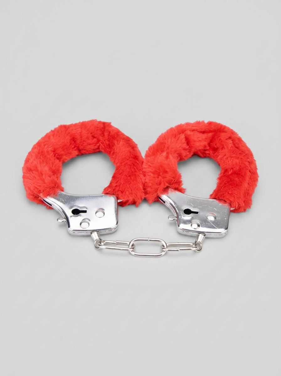 Heavy duty furry handcuffs by Bound to Play, adjustable and comfortable cuffs for playful restraint, shown in the image.