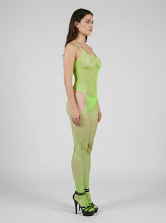 Full view of the Rene Rofe Lime Green Industrial Net Suspender Bodystocking worn in a stylish setting, perfect for boudoir and clubwear.