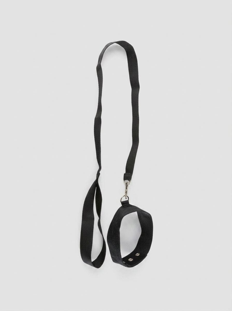 Fetish Fantasy BDSM kit featuring a velvet collar, matching cuffs, and candle for bondage and sensory play.