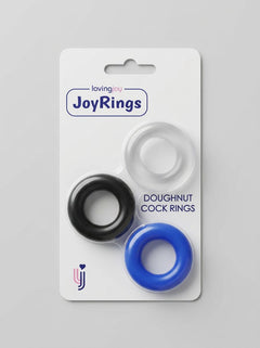 Packaged JoyRings Doughnut Stretchy Cock Rings (3 Pack) in white, black and blue, presented in branded retail packaging for these luxury cock rings.