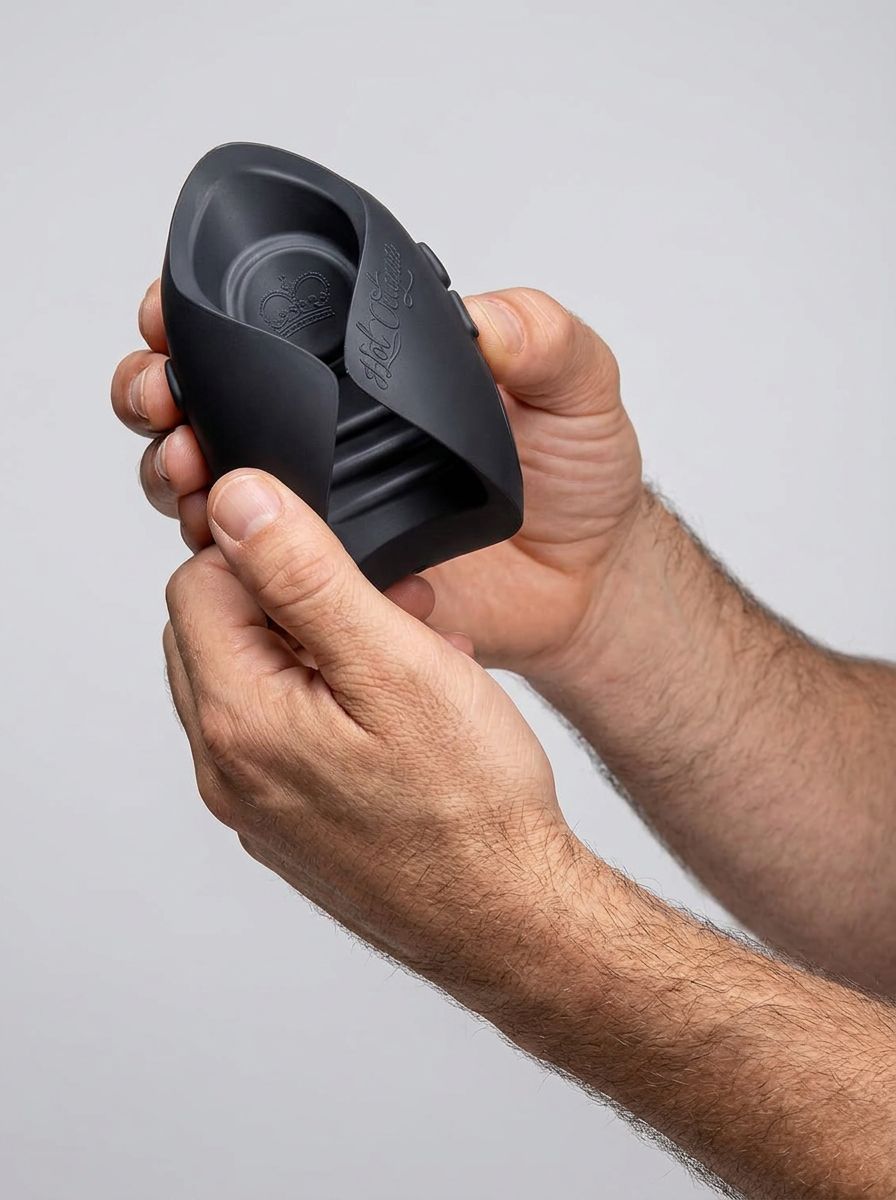 Hot Octopuss Pulse Solo Essential Male Stroker in black, premium vibrating male stroker front view