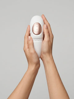 Satisfyer Pro 4 Couples Vibrator, wearable clitoral stimulator with suction function, designed for intimate pleasure.