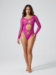 Back view of the Exposed Pink Rhinestone Long Sleeve Cut Out Fishnet Teddy emphasizing the flattering thong back silhouette and thumb loop sleeve details, perfect for glamorous occasions.