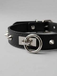 Luxury Leather O-Ring Studded Choker highlighting its adjustable buckle closure and exquisite craftsmanship.