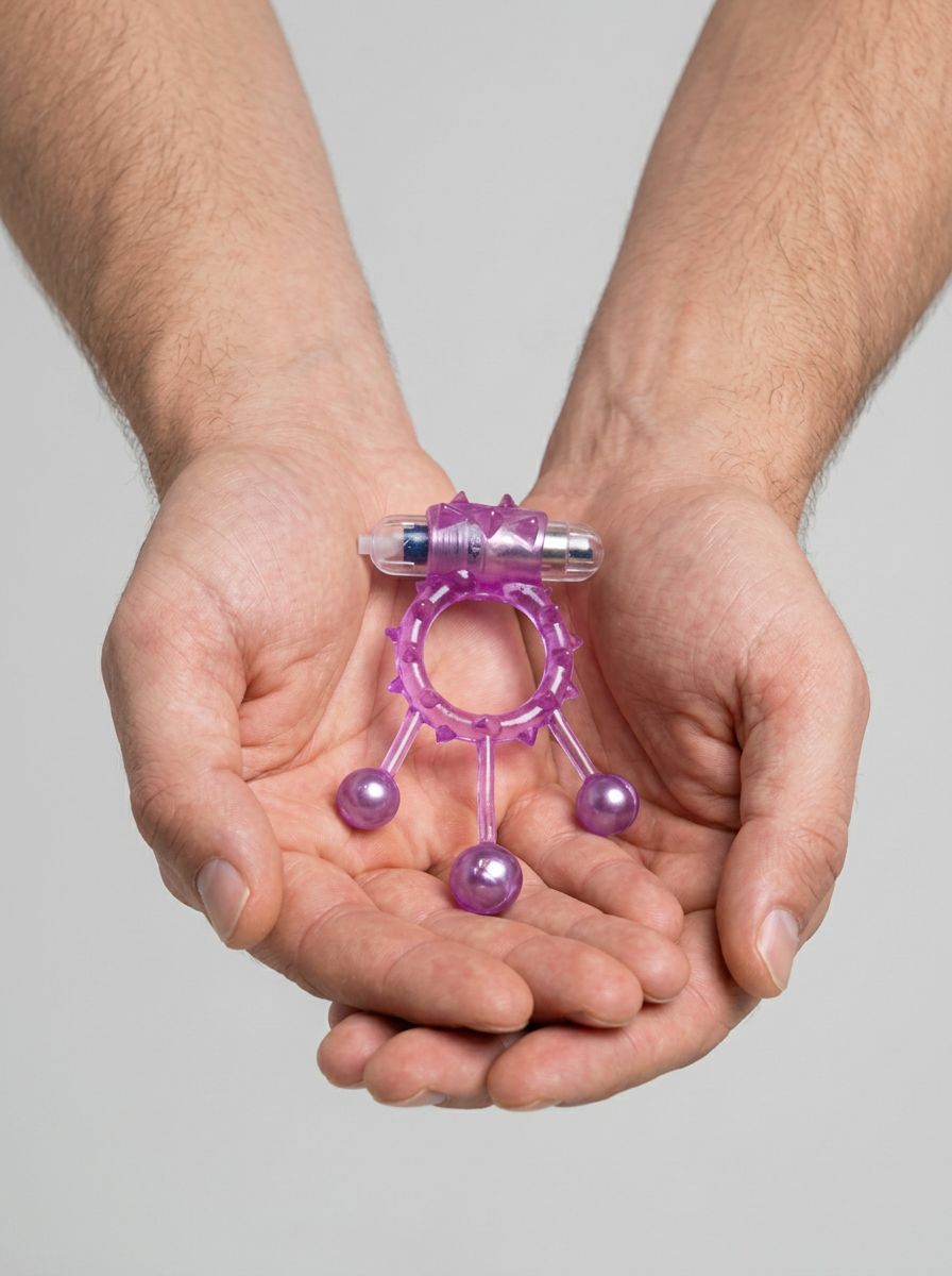 Me You Us Ball Banger vibrating cock ring with removable bullet, shown in close-up on a white background.