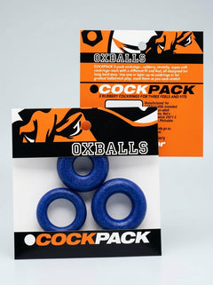 Chic presentation of Oxballs Cockpack Cock Ring Set, featuring three distinct designs for tailored fits, ideal for daily wear or intense play.