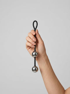 Luxurious Scandals Heavy Metal Ben Wa Balls designed for enhanced stimulation, featuring a sleek and stylish look, perfect for intimate experiences with metal ben wa balls.