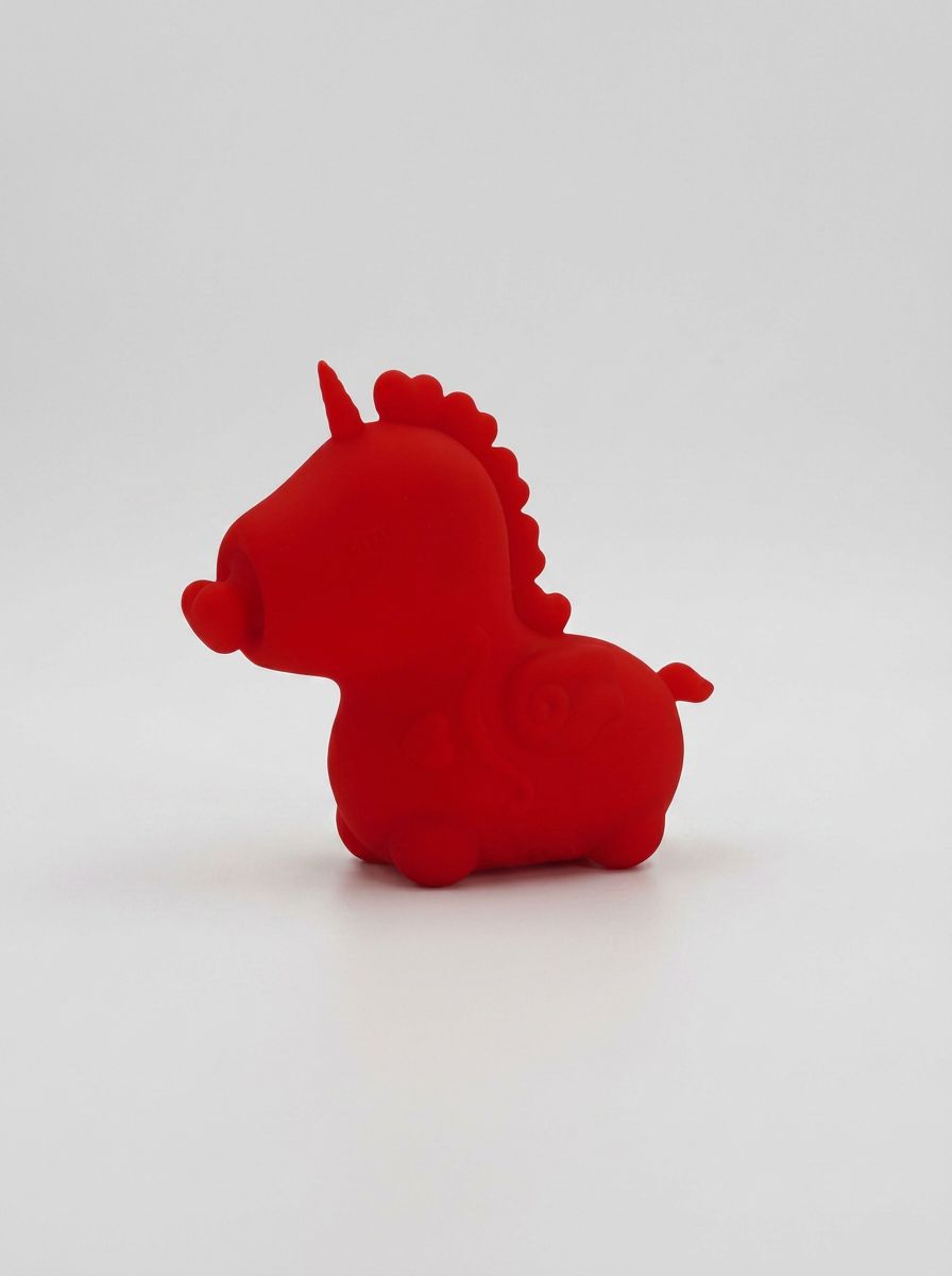 Unihorn - Cupid's Beau (The Heart Nosed One) elegantly designed as a luxurious massaging vibrator featuring a whimsical heart-shaped nose.