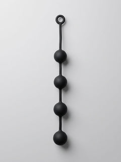 Prowler RED Silicone Anal Beads standing tall, highlighting their luxurious black finish and superior design.