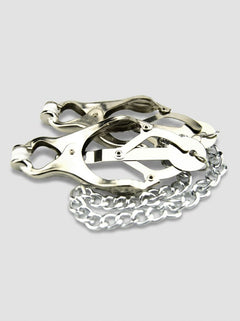 Artistic arrangement of Bound to Please Clover Nipple Clamps, showcasing their adjustable chain mechanism for customised pleasure and a high-end fetish accessory.
