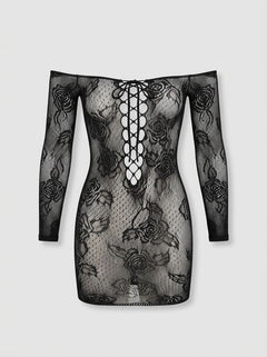 A model wearing the Rene Rofe Tie Breaker Black Long Sleeve Floral Lace Dress, illustrating its elegant fit and dramatic design ideal for romantic nights and special occasions.