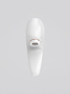 Satisfyer Pro 4 Couples Vibrator, a wearable clitoral stimulator with suction for intimate pleasure, shown on a white background.