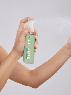 Loving Joy Cleanse gentle antibacterial toy cleaner spray for sex toys, in a clear bottle with white spray nozzle.