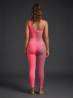 Model wearing the Fantasy Lingerie Glow Hyperdrive UV Reactive Rhinestone Bodystocking, a standout UV bodystocking perfect for clubs and festivals.
