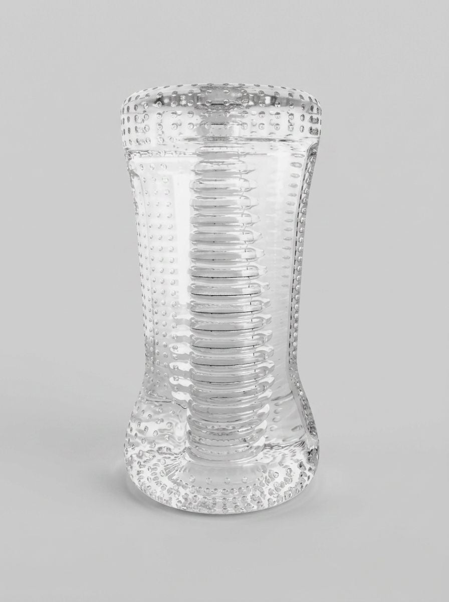 Transparent Ripple Dual End Stroker male masturbator by Me You Us, showing the textured interior and sleek design.