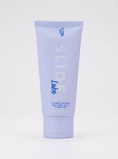 Loving Joy Slide Water-Based Lubricant on soft fabric illustrating its non-greasy, ultra-smooth texture for intimate indulgence.